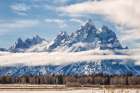USA, Wyoming, Jackson. Grand Teton National Park, Grand Teton and other peaks emerge from clouds Art Print